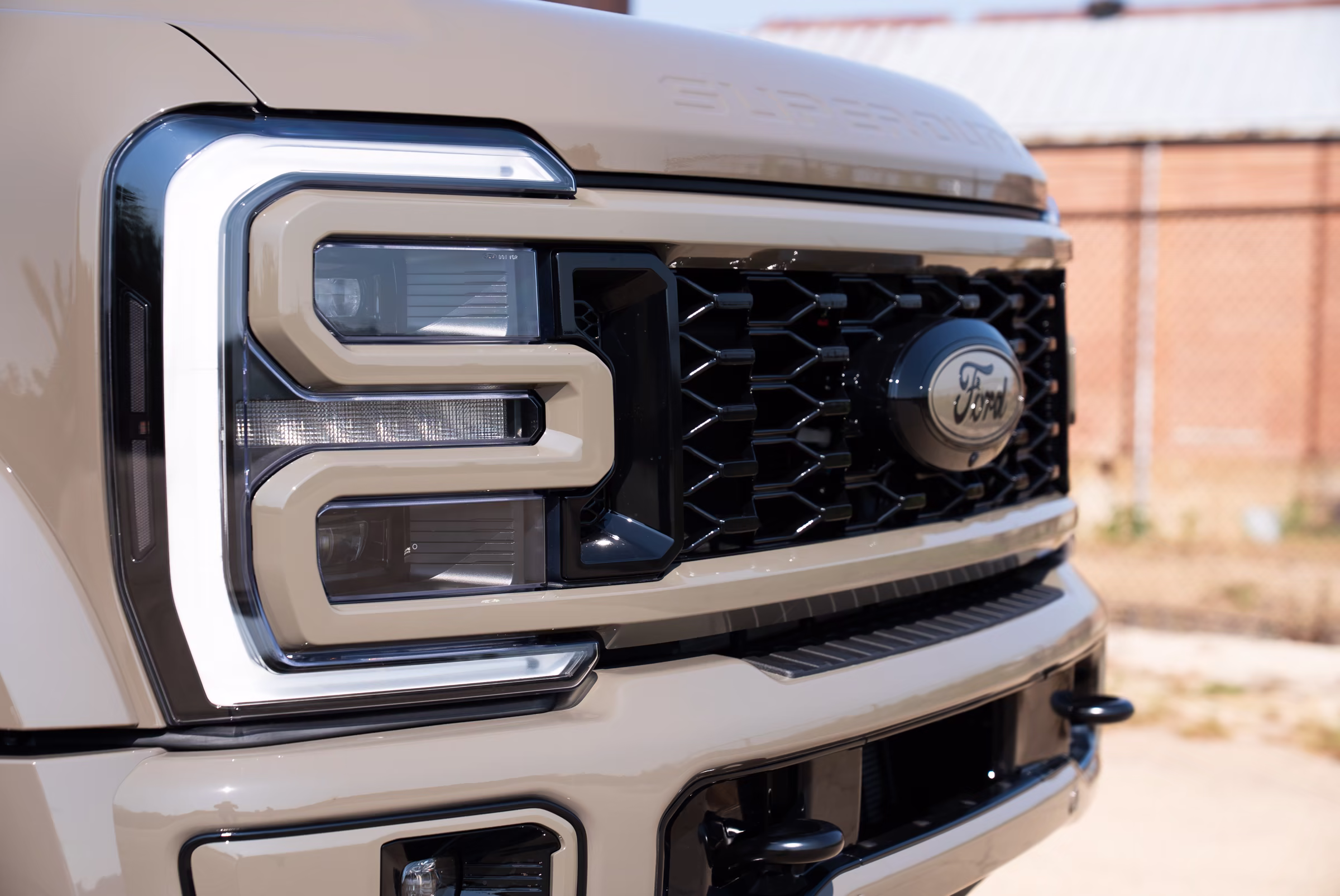 Paint-matched headlight and dark grille detail on the F-450