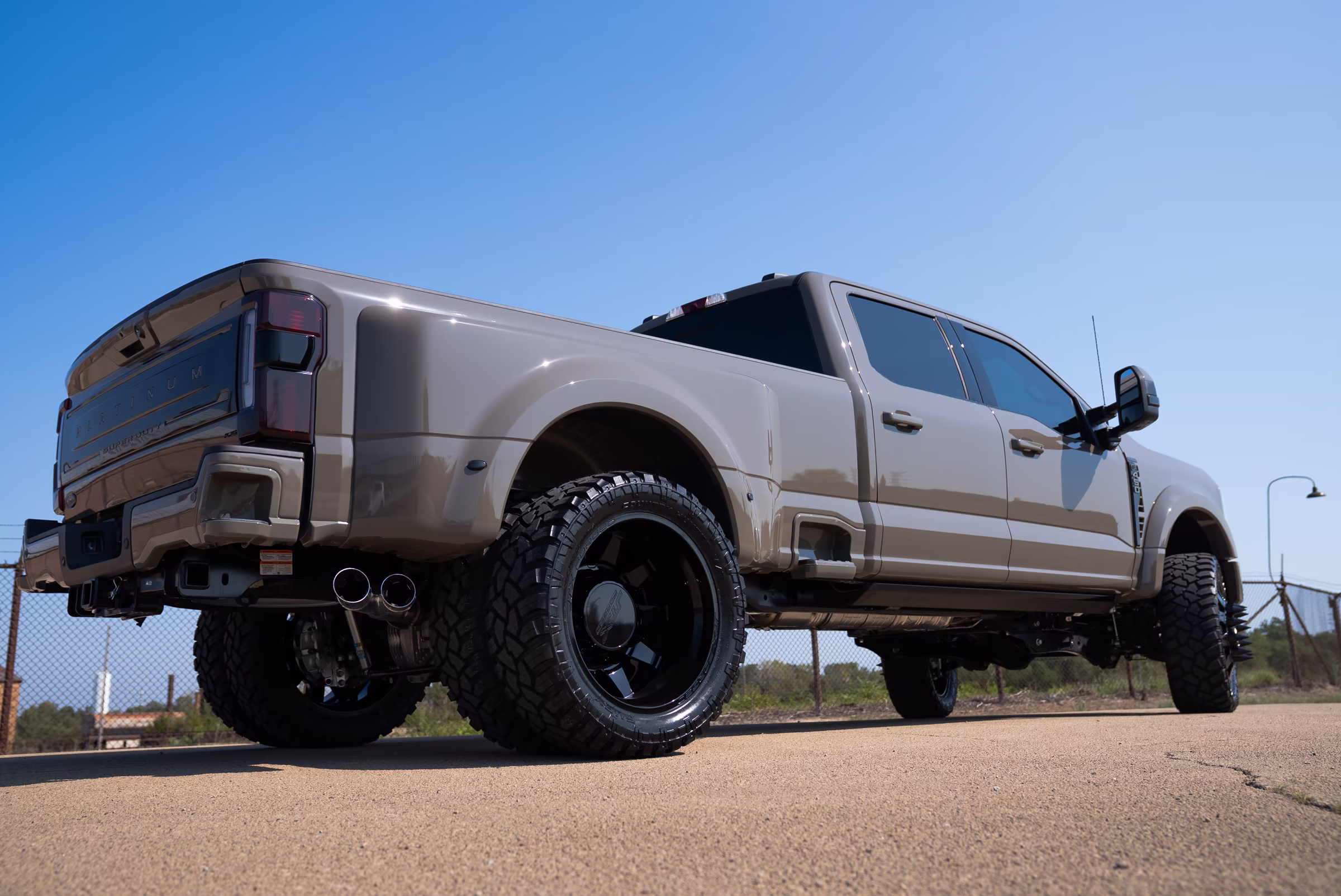 Low rear view showing the dually stance and rear wheel fitment