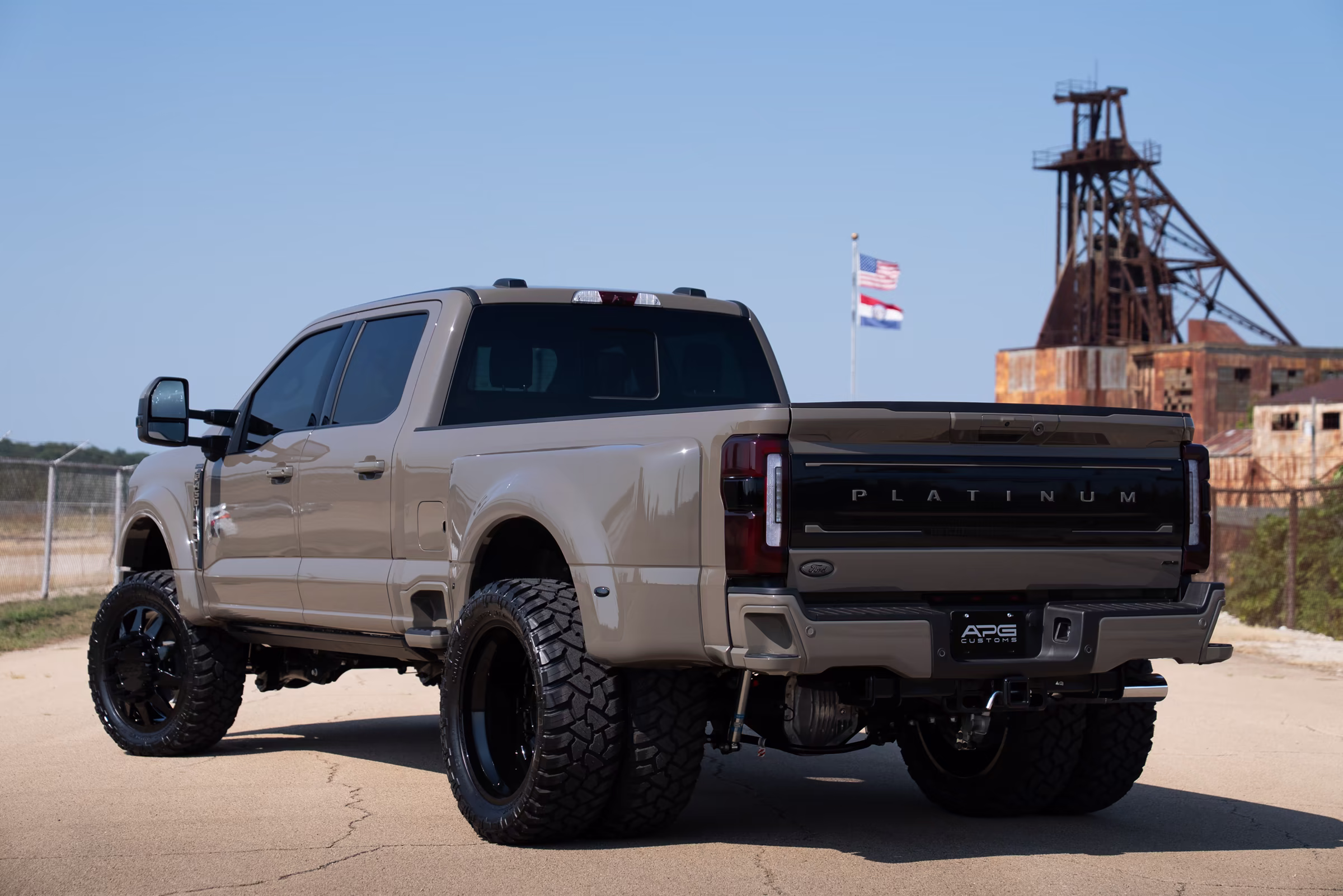 Wide rear three-quarter view of the completed APG Customs F-450 build