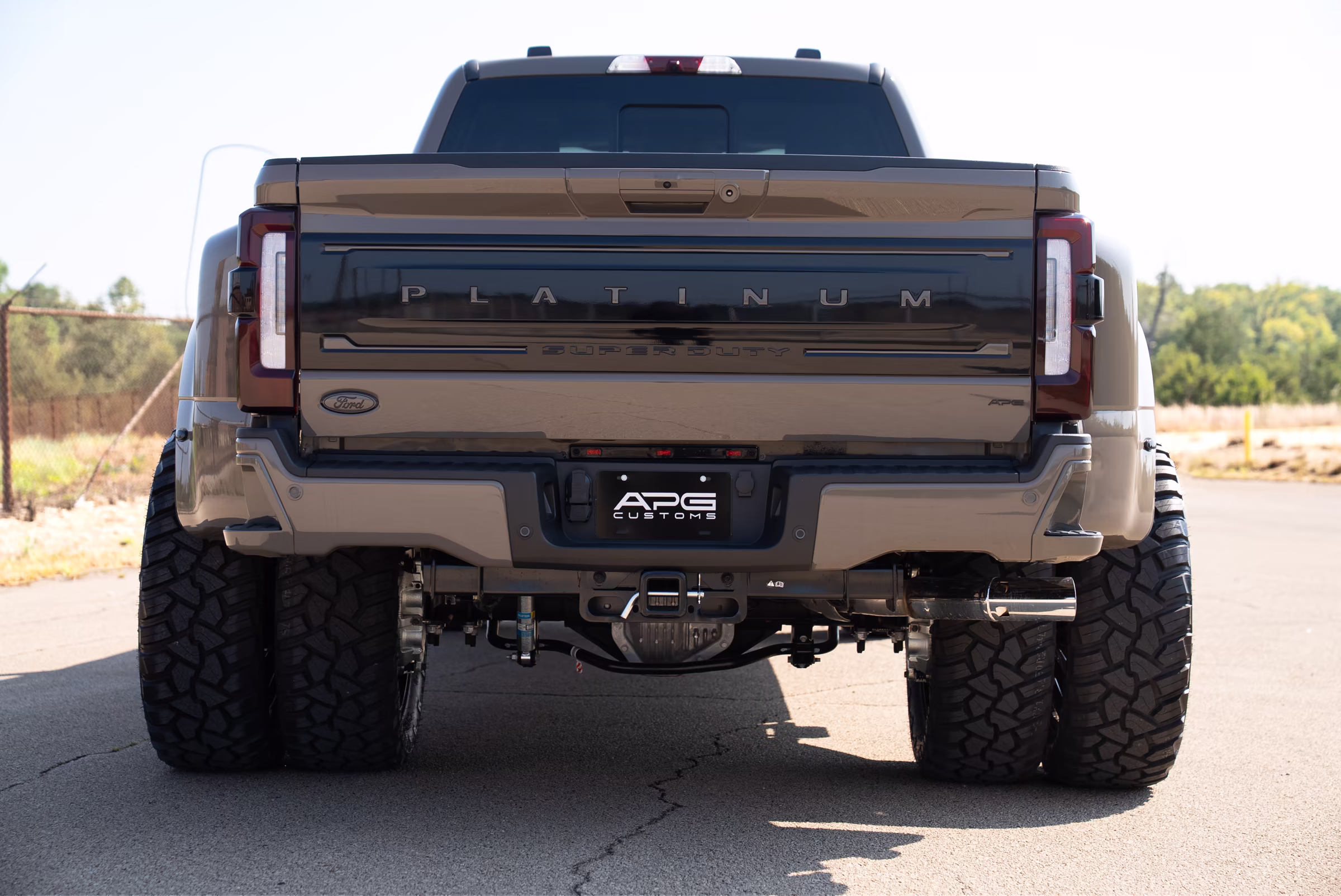 Rear view of the Marsh Gray F-450 Platinum with APG Customs plate