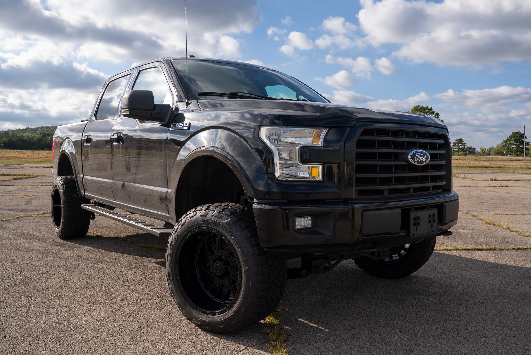 Black Ford F-150 after its APG suspension build