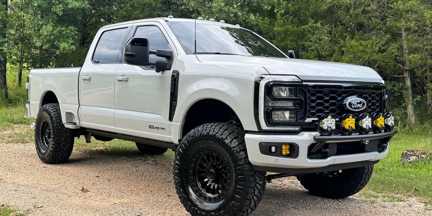 White 2025 Ford F-250 Lariat with APG ReadyLift, Fuel wheels and front lighting