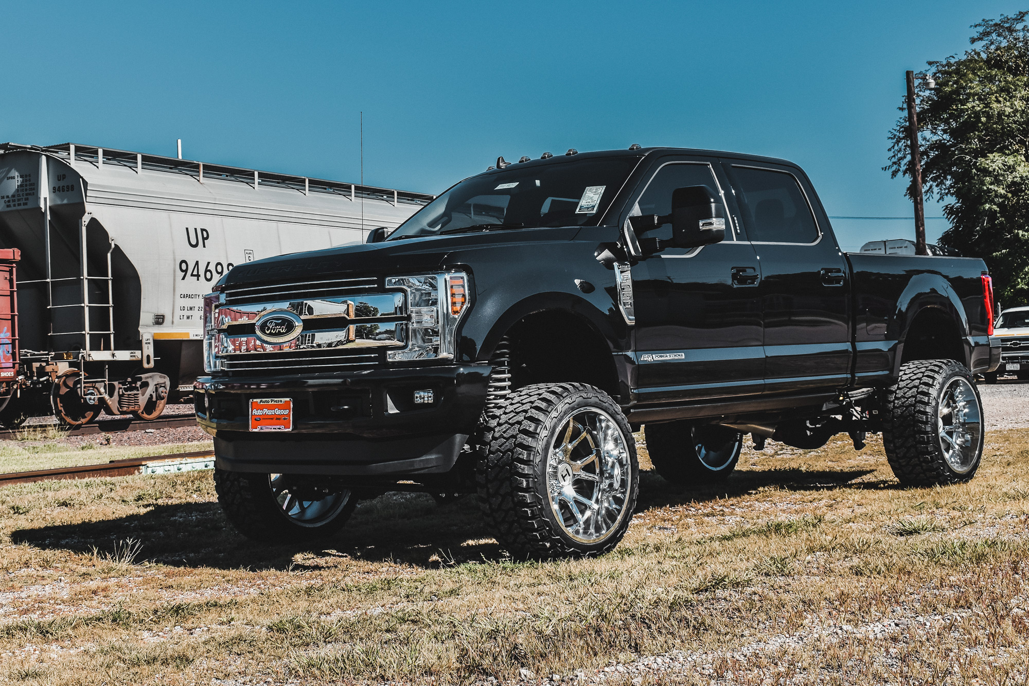 Front three-quarter view of a custom Ford truck