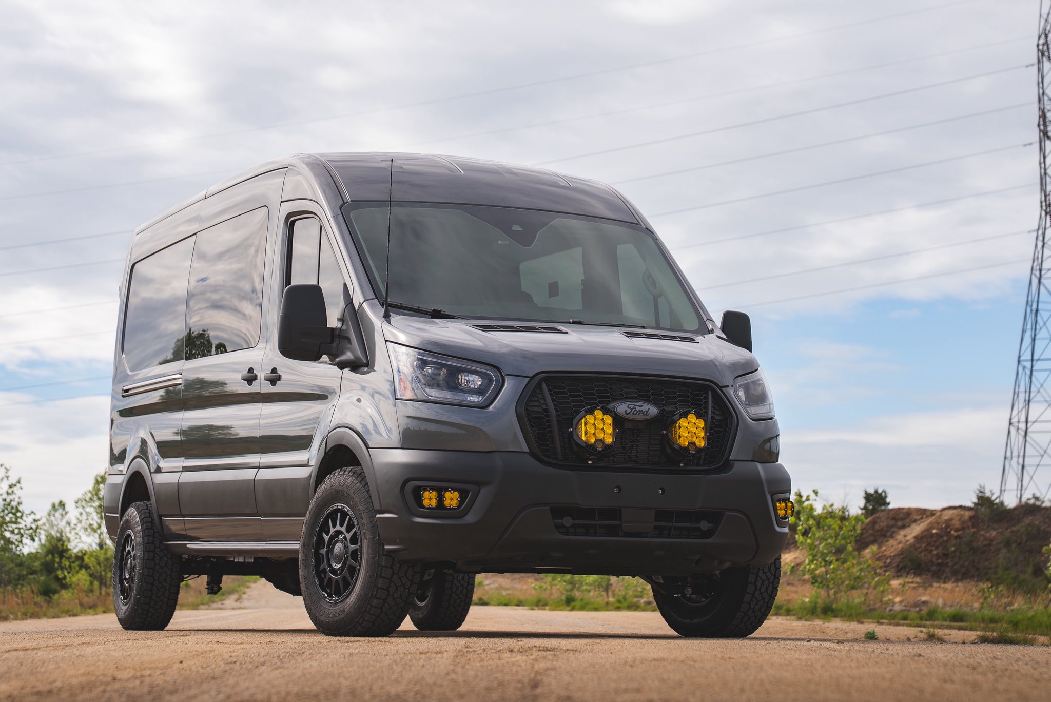Lifted Ford Transit overland van with auxiliary lighting